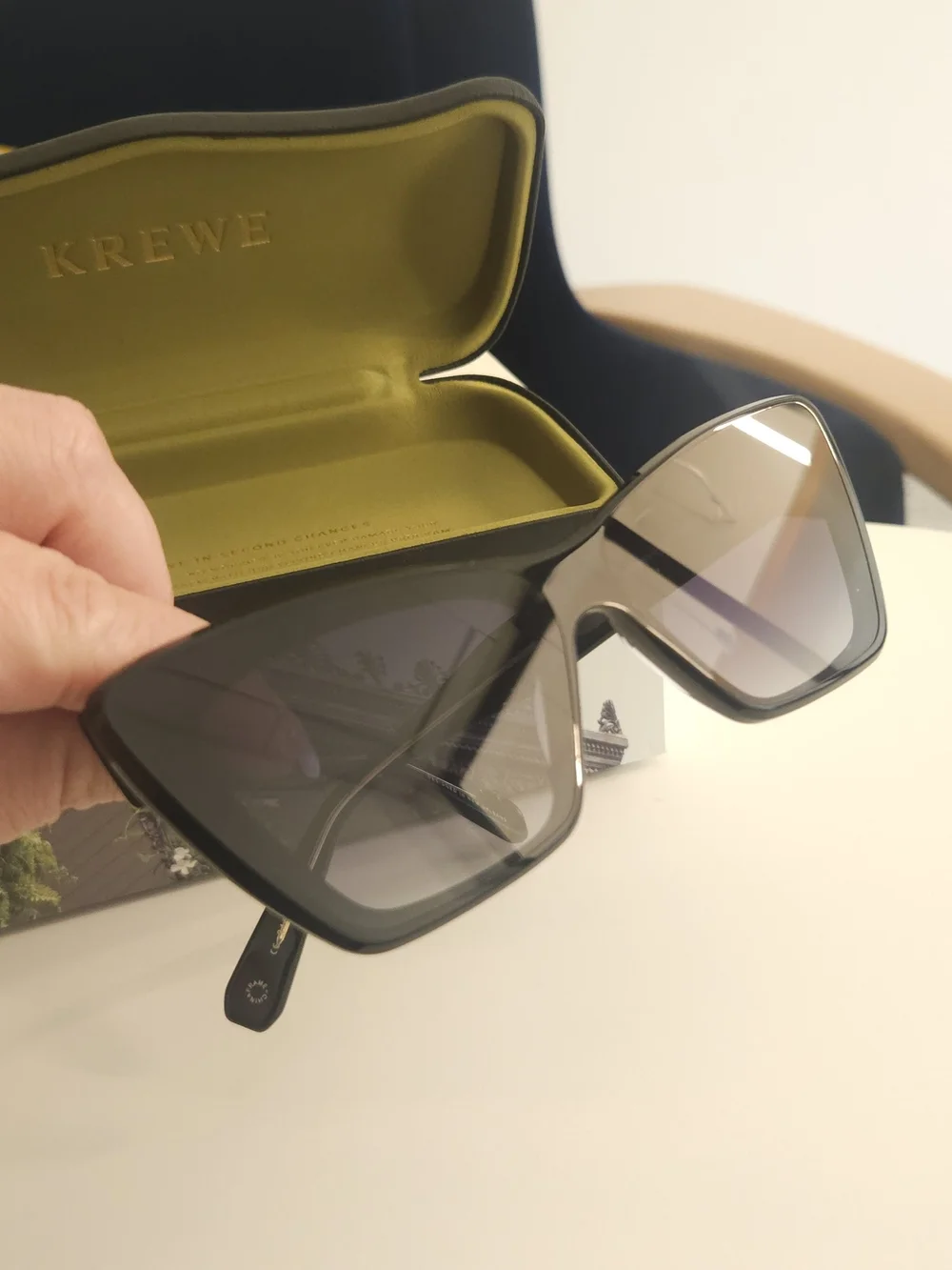 KREWE Black Cat-Eye Sunglasses with Gold Temples and Gradient Lenses